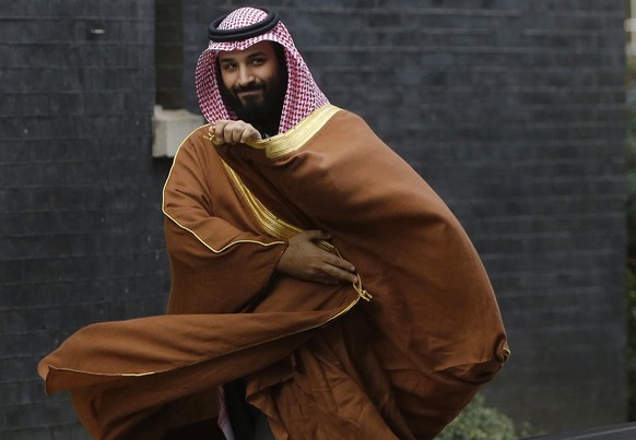 FILE - In this March 7, 2018 file photo, Saudi Crown Prince Mohammed bin Salman arrives to meet Prime Minister Theresa May outside 10 Downing Street in London. Saudi Arabia is moving ahead with plans  ...