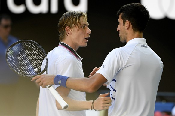 Serbia&#039;s Novak Djokovic, right, is congratulated by Canada&#039;s Denis Shapovalov after winning their third round match at the Australian Open tennis championships in Melbourne, Australia, Satur ...