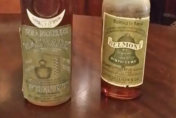 Rare bottles of Belmont (R) and Cascade Kentucky bourbon are seen at the Filson Historical Society in Louisville, Kentucky September 19, 2014. The Louisville preservation society will open more than t ...