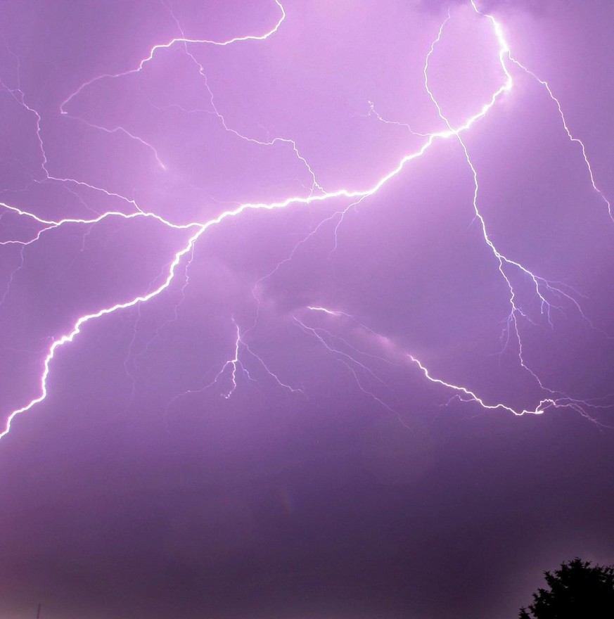 epa01366779 A thunder storm and lightning passes over the old town village of Arnsberg in Sauerland, Germany, 03 June 2008. Two women drowned overnight in the south-western German state of Baden-Wuert ...