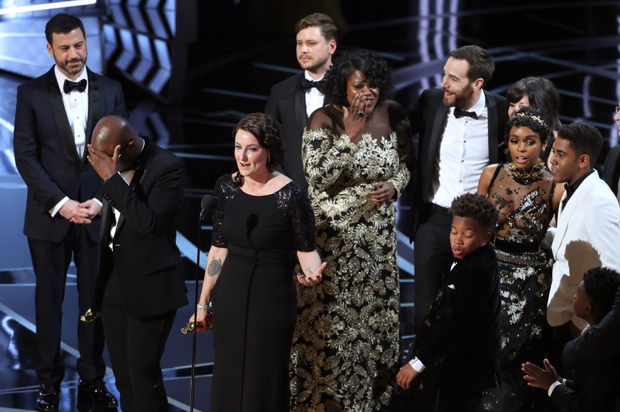 89th Academy Awards - Oscars Awards Show - Adele Romanski speaks as the cast of best picture Moonlight stand on stage. REUTERS/Lucy Nicholson
