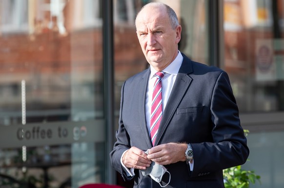 epa08716968 Dietmar Woidke, President of the Federal Council, attends an ecumenical church service at Saint Peter and Paul church during German Unity Day in Potsdam, Germany, 03 October 2020. EPA/ANDR ...