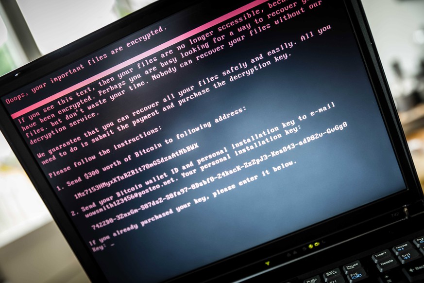 epaselect epa06053537 A laptop screen displays a message after it was infected with ransomware during a worldwide cyberattack, in Geldrop, Netherlands, 27 June 2017 (issued 28 June 2017). Kaspersky La ...
