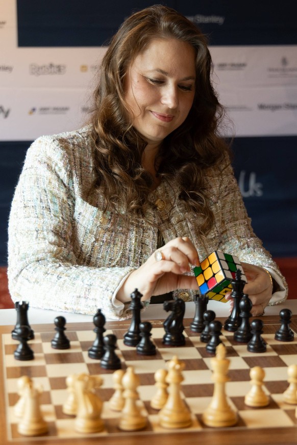 250916 -- BUDAPEST, Sept. 16, 2025 -- Judit Polgar, chess grandmaster, plays a game of RubikChess at the press conference of the Global Chess Festival in Budapest, Hungary on Sept. 16, 2025. To go wit ...