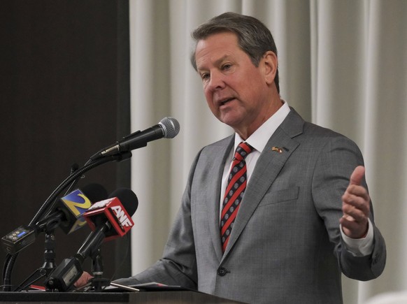 FILE -- Georgia Gov. Brian Kemp speaks to members of the Athens Area Chamber of Commerce regarding the beating death of nursing student Laken Riley on Monday, Feb. 26, 2024, in Athens, Ga. Kemp on Wed ...