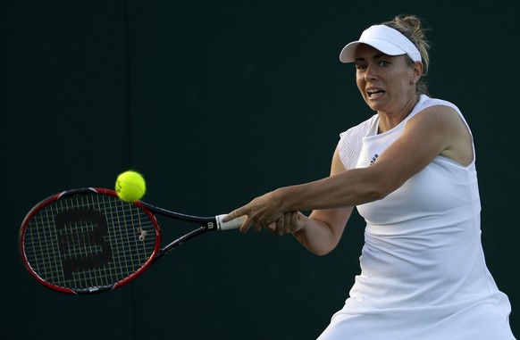 Slovakia&#039;s Kristina Kucova returns to Canada&#039;s Bianca Andreescu during their Women&#039;s Singles Match on day two at the Wimbledon Tennis Championships in London Tuesday, July 4, 2017. (AP  ...