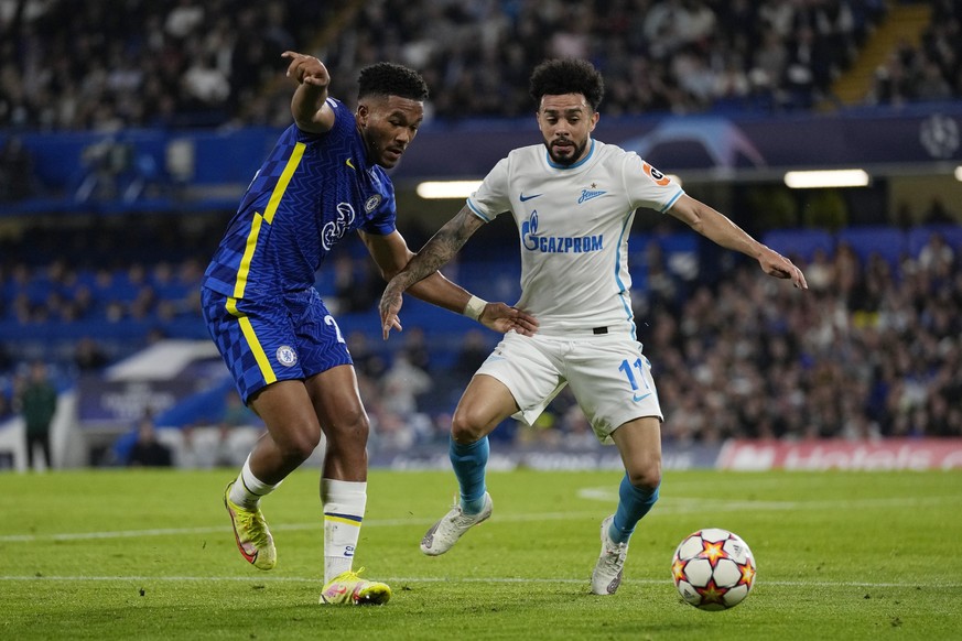 Chelsea&#039;s Reece James, left, challenges for the ball with Zenit&#039;s Claudinho during the Champions League Group H soccer match between Chelsea and Zenit St Petersburg at Stamford Bridge stadiu ...