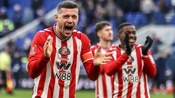 Emirates FA Cup Third Round Everton v Sunderland Granit Xhaka of Sunderland celebrates with the sunderland fans after a perfect penalty shootout sends Sunderland into the fourth round of the FA Cup du ...