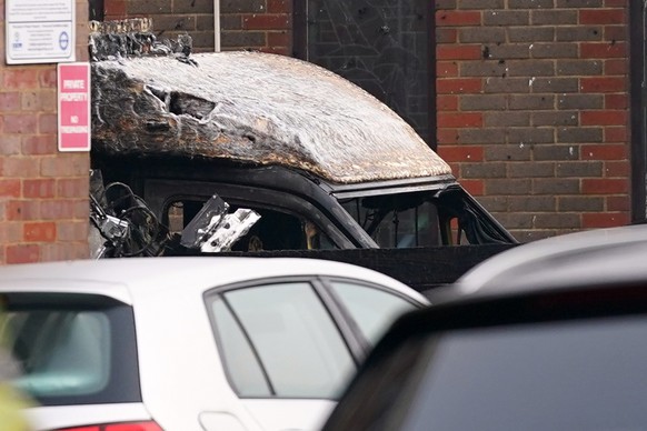 A burnt car is seen in Golders Green, London, Monday, March 23, 2026 after an apparent arson attack on four vehicles belonging to a Jewish ambulance service, Hatzola Northwest, in London.(AP Photo/Alb ...