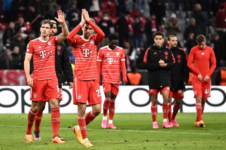 epa10580984 Thomas Mueller (3-L) of Bayern Munich reacts after the UEFA Champions League quarter final, 2nd leg match between Bayern Munich and Manchester City in Munich, Germany, 19 April 2023. Munic ...