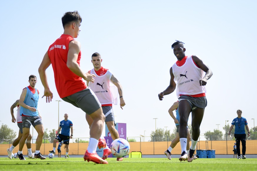 epa10308023 From left: Swiss players Remo Freuler, Ardon Jashari, Granit Xhaka and Breel Embolo attend a training session of Swiss national soccer team in preparation for the FIFA World Cup Qatar 2022 ...