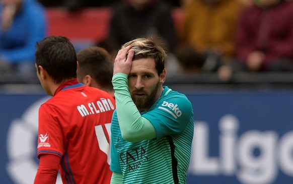 Football Soccer - Osasuna v Barcelona - Spanish La Liga Santander - El Sadar, Pamplona, Spain - 10/12/2016 Barcelona's Lionel Messi reacts. REUTERS/Vincent West