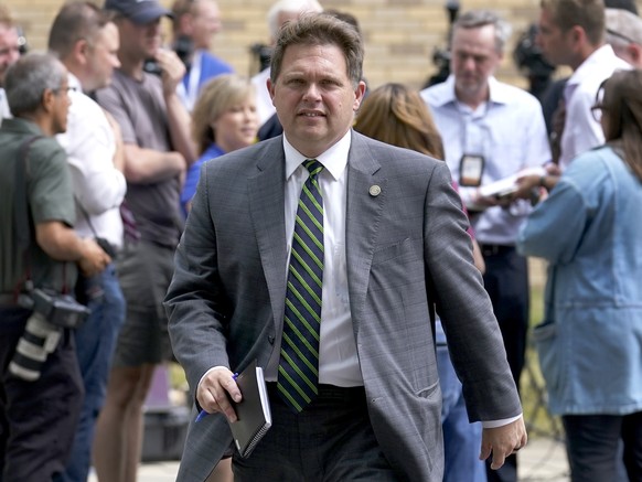 Lake County, Ill., State&#039;s Attorney Eric Rinehart returns to the county courthouse after speaking to reporters at the conclusion of the initial appearance of Robert E. Crimo III Wednesday, July 6 ...