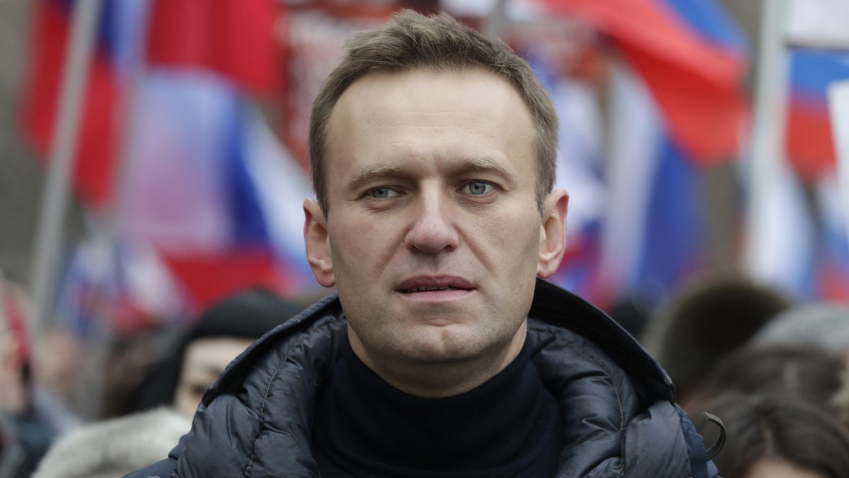 FILE - In this Sunday, Feb. 24, 2019 file photo, Russian opposition activist Alexei Navalny takes part in a march in memory of opposition leader Boris Nemtsov in Moscow, Russia. In August 2020, the op ...
