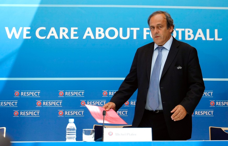 FILE - In this Aug. 28, 2015 file photo UEFA President Michel Platini arrives at a press conference after the soccer Europa League draw ceremony at the Grimaldi Forum, in Monaco. On Thursday, Oct. 8,  ...