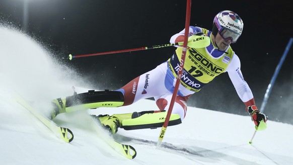 Switzerland&#039;s Daniel Yule speeds down the course during an alpine ski, men&#039;s World Cup slalom, in Madonna di Campiglio, Italy, Wednesday, Dec. 22, 2021. (AP Photo/Gabriele Facciotti)