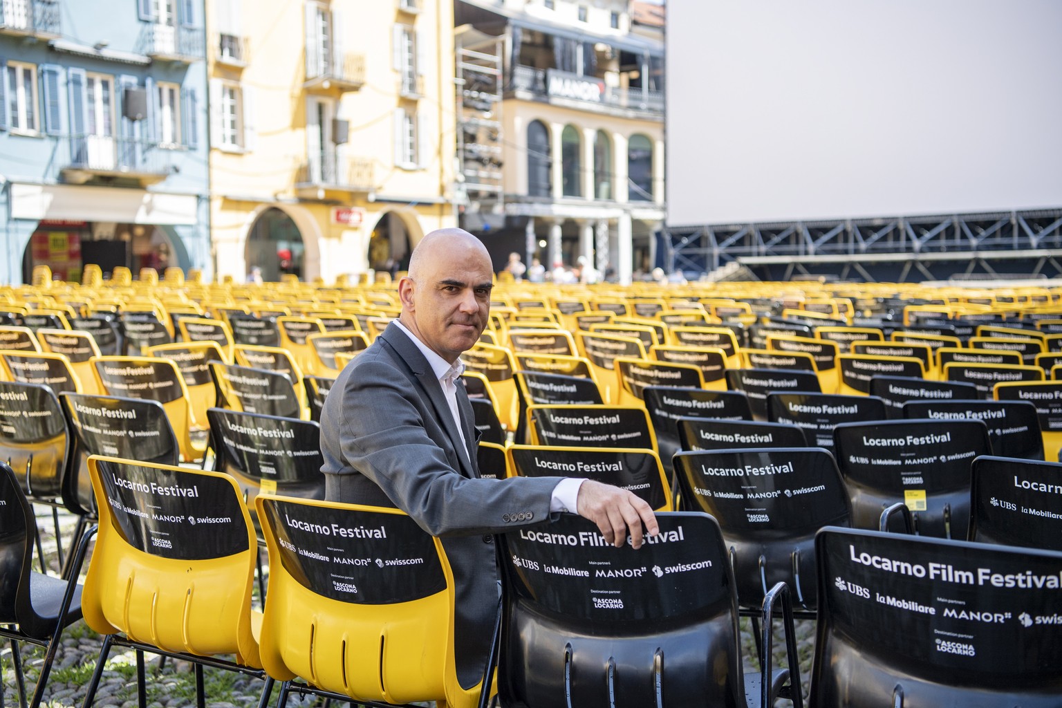 epa09397212 Swiss Federal Councillor Alain Berset poses at the Piazza Grande, the open-air venue of the 74th Locarno International Film Festival, in Locarno, Switzerland, 05 August 2021. The Festival  ...