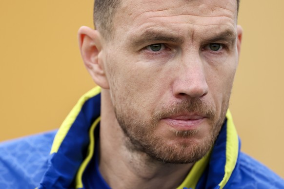 Bosnia's captain Edin Dzeko arrives to the training session ahead of the World Cup playoff final soccer match against Italy, at the Butmir training centre, in Sarajevo, Bosnia, Monday, March 30,  ...