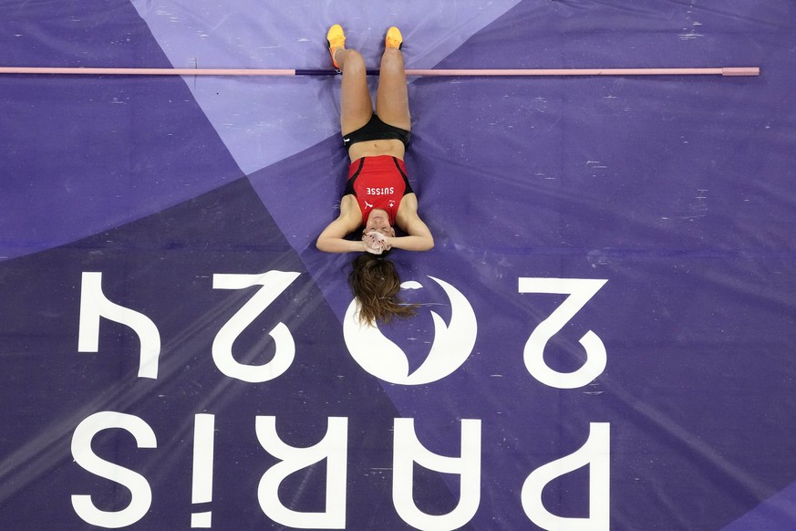 Angelica Moser, of Switzerland, reacts after missing her final attempt in the women&#039;s pole vault final at the 2024 Summer Olympics, Wednesday, Aug. 7, 2024, in Saint-Denis, France. (AP Photo/Davi ...