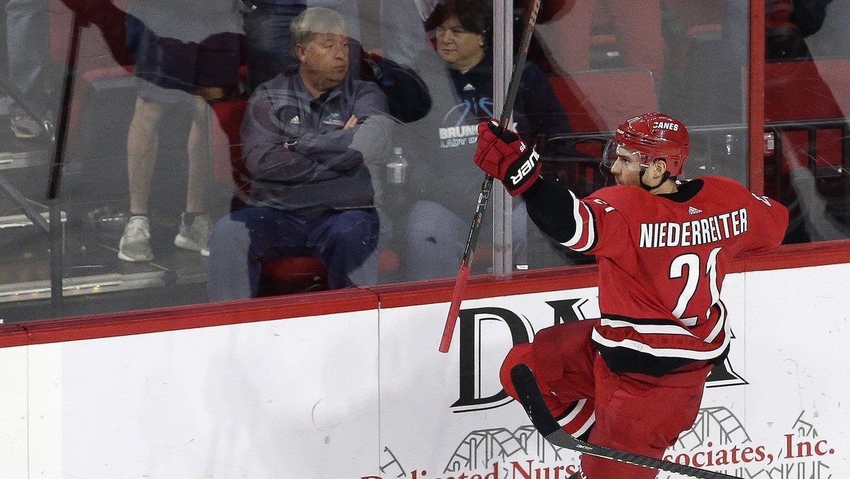Carolina Hurricanes' Nino Niederreiter, of the Czech Republic, celebrates his goal against the New Jersey Devils during the third period of an NHL hockey game in Raleigh, N.C., Thursday, April 4, ...
