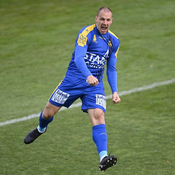 BEVEREN, BELGIUM - APRIL 6 : Michael Frey forward of Beveren jumps up to celebrate scoring the opening goal during the Jupiler Pro League match between Waasland-Beveren and Sint-Truidense VV at the Fr ...