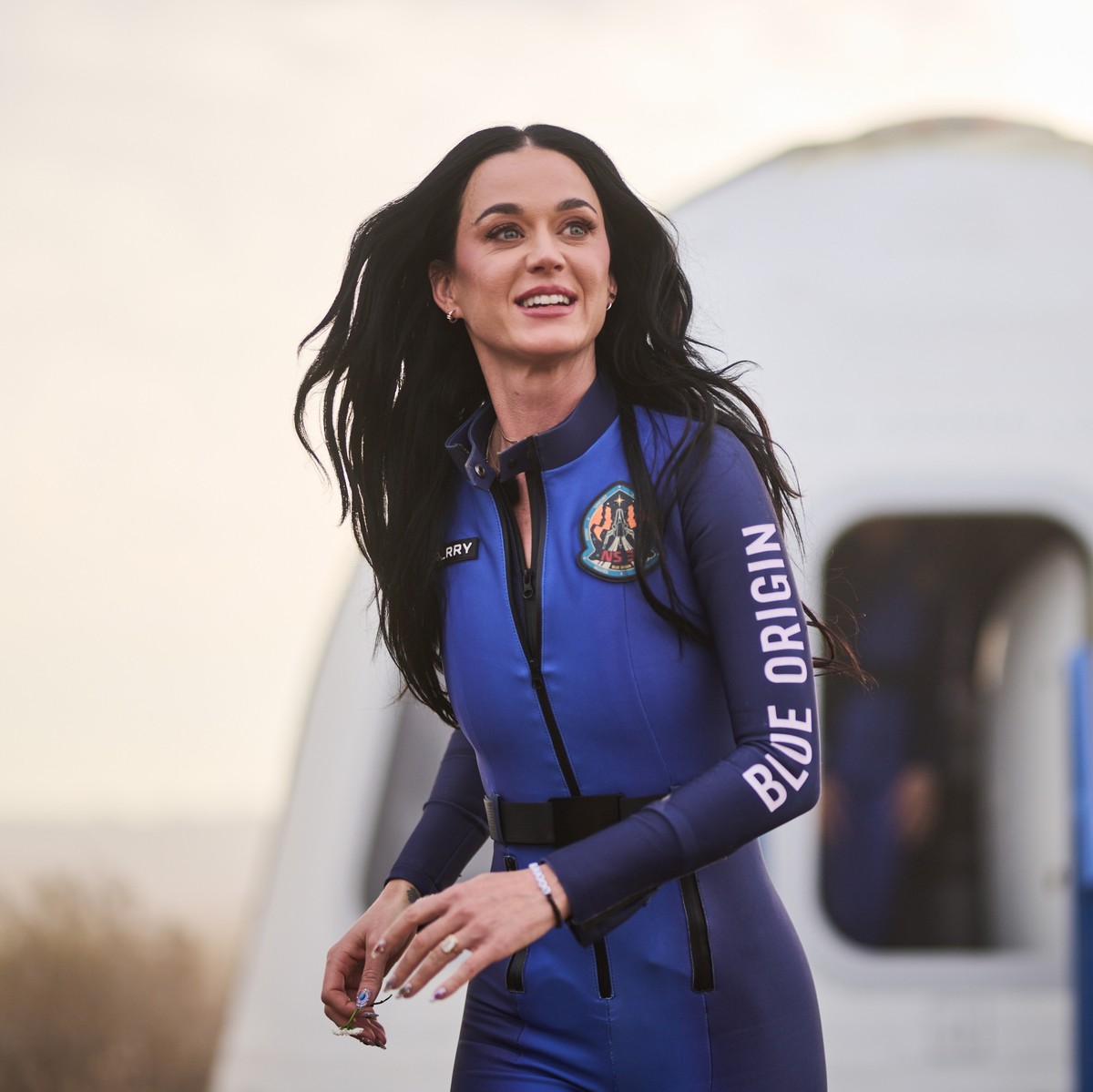 epa12032410 A handout photo made available by Blue Origin shows US singer Katy Perry after being aboard Blue Origin?s New Shepard NS-31 rocket on a short mission into orbit after taking off from Launc ...