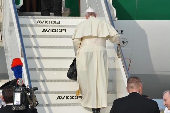 Pope Francis boards the airplane for the ecumenical pilgrimage to Geneva, at the &#039;Leonardo Da Vinci&#039; airport in Fiumicino, in the outskirts of Rome, Thursday, June 21, 2018. The visit is par ...