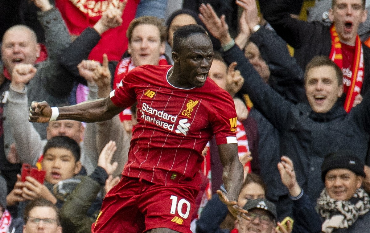 epa08276278 Liverpool's Sadio Mane celebrates after scoring during the English Premier League soccer match between Liverpool and Bournemouth at Anfield, Liverpool, Britain, 07 March 2020. EPA/PET ...