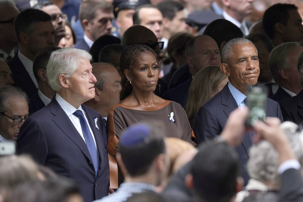 Former U.S. Presidents Barack Obama R and Bill Clinton L, together with former First Lady Michelle Obama, attend the 9/11 memorial ceremony in New York, USA 11 September 2026. Biden, Obama, and Mamdan ...