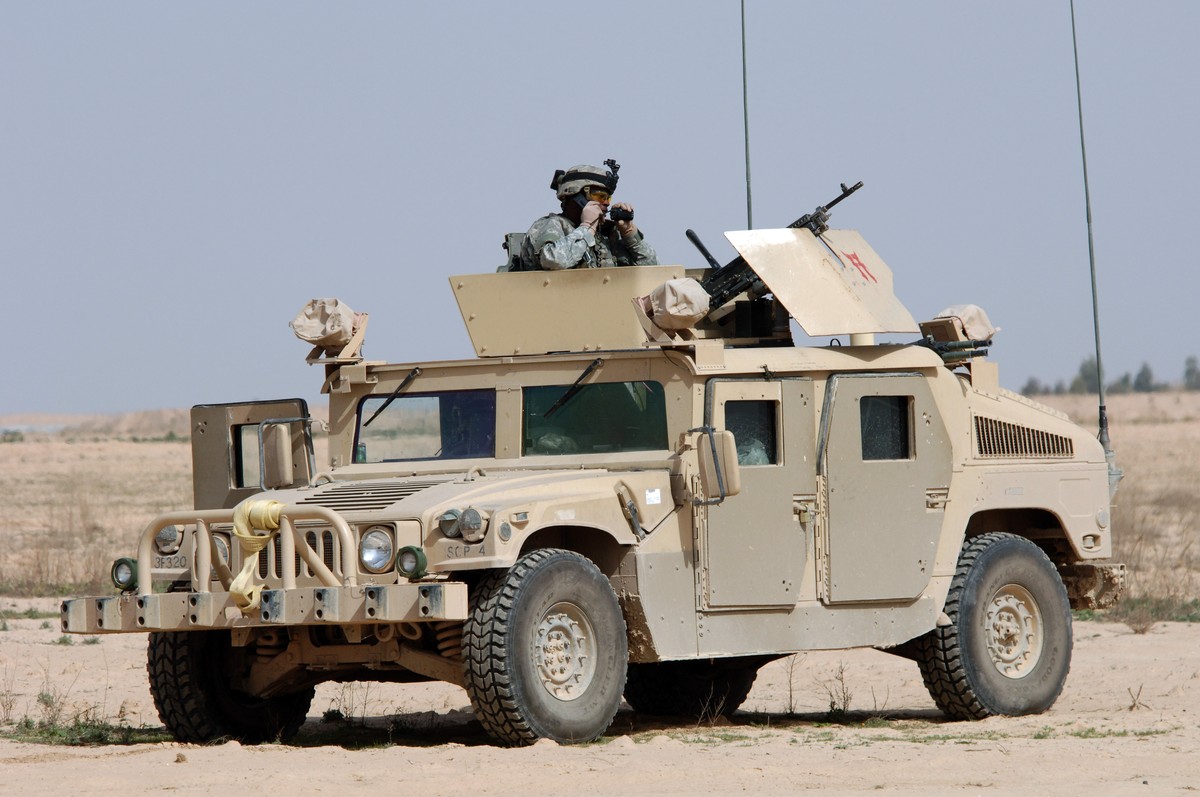 060322-N-5438H-018Salah Ad Din Province, Iraq (March 22, 2006) Ð U.S. Army soldiers assigned to the Bravo Battery 3rd Battalion 320th Field Artillery Regiment along with Iraq Army soldiers from the 1 ...