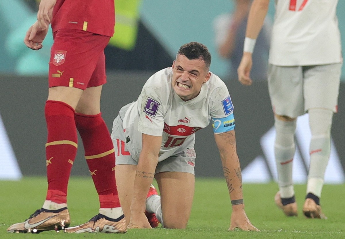 epa10345185 Granit Xhaka of Switzerland reacts during the FIFA World Cup 2022 group G soccer match between Serbia and Switzerland at Stadium 947 in Doha, Qatar, 02 December 2022. EPA/Friedemann Vogel