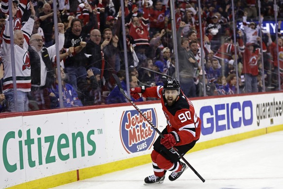 New Jersey Devils left wing Tomas Tatar (90) reacts after scoring a goal against the New York Rangers during the second period of Game 7 of an NHL hockey Stanley Cup first-round playoff series Monday, ...