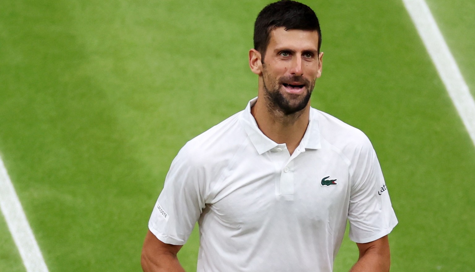 epa10746179 Novak Djokovic of Serbia reacts during his Men&#039;s Singles semi-final match against Jannik Sinnner of Italy at the Wimbledon Championships, Wimbledon, Britain, 14 July 2023. EPA/ISABEL  ...