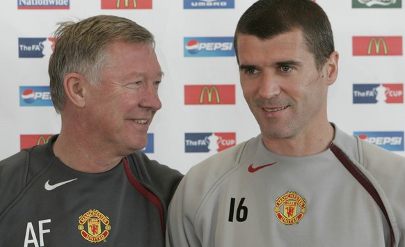 Manchester United manager Sir Alex Ferguson, left, and captain Roy Keane wait to answer questions from reporters at the team&#039;s Carrington training ground as the team prepare for their FA Cup fina ...