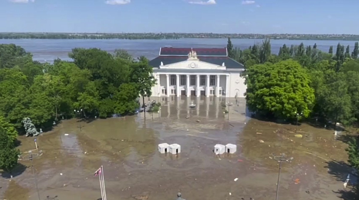 In this handout photo taken from video released by Russian-controlled administration of Kherson Region on Wednesday, June 7, 2023, the central square of Nova Kakhovka is flooded after the Kakhovka dam ...