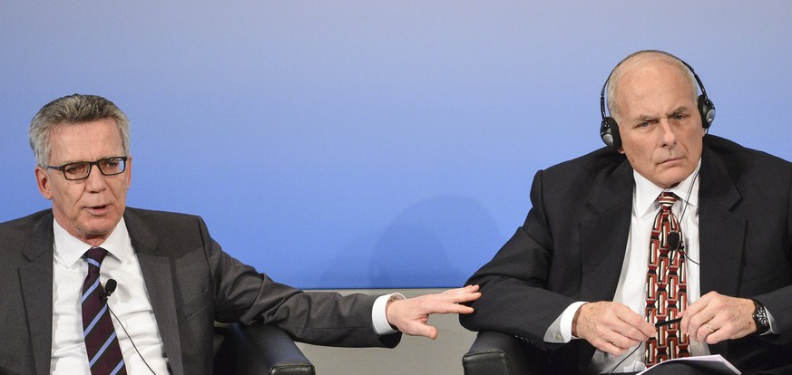 epa05802284 German Interior Minister Thomas de Maiziere (L) and US Secretary of Homeland Security John Kelly (R) participate in a panel discussion during the 53rd Munich Security Conference (MSC) in M ...