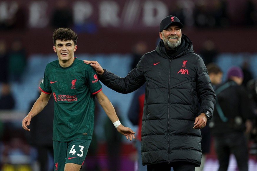 Mandatory Credit: Photo by Paul Currie/Shutterstock 13673490ew Stefan Bajcetic of Liverpool celebrates at the end of the match with manager Jurgen Klopp Aston Villa v Liverpool, Premier League, Footba ...