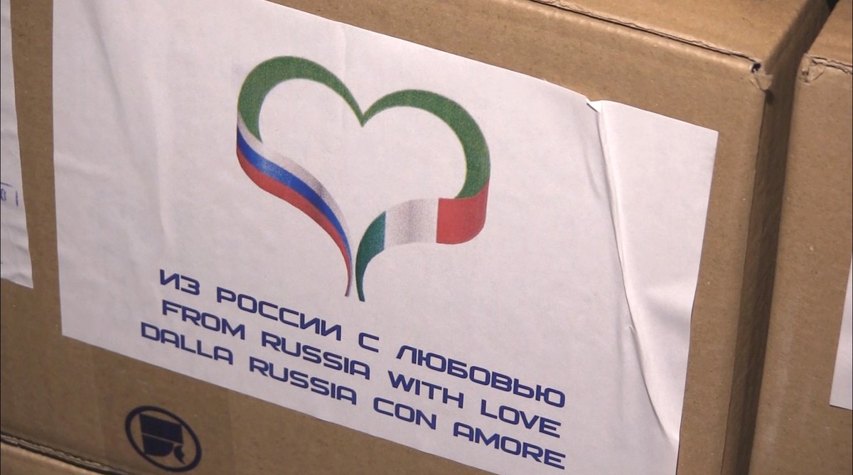 epa08320863 A still image from a handout video footage release 25 March 2020 by the press service of the Russian defence Ministry shows an inscription 'From Russia With Love' visible on a bo ...