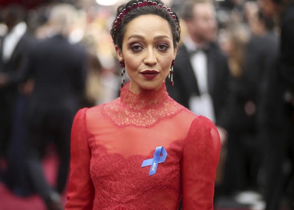 Ruth Negga, wearing the ACLU ribbon, arrives at the Oscars on Sunday, Feb. 26, 2017, at the Dolby Theatre in Los Angeles. (Photo by Matt Sayles/Invision/AP)