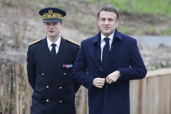 epa11188677 Seine-Saint-Denis&#039;s Prefect Jacques Witkowski (L) and France&#039;s President Emmanuel Macron walk during the inauguration of the Paris 2024 Olympic village in Saint-Denis, northern P ...