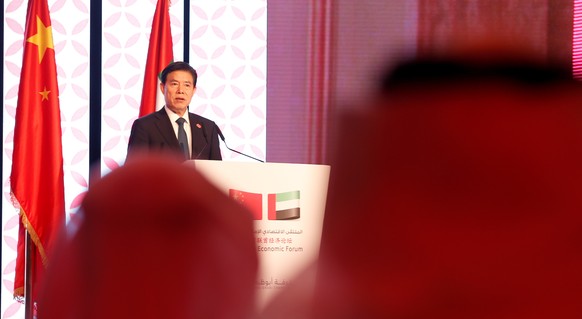 epa06901080 Zhong Shan Minister of Commerce of China gives his speech during UAE-China Economic Forum in Abu Dhabi, United Arab Emirates on 20 July 2018. EPA/ALI HAIDER