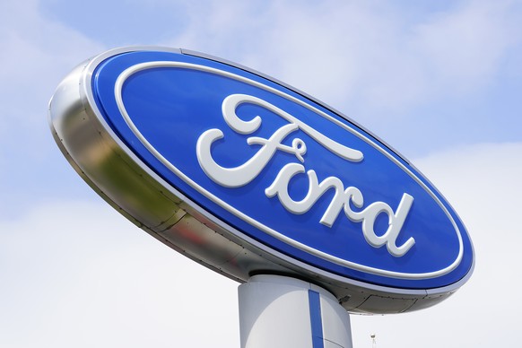 FILE - A Ford sign is displayed at a dealership in Springfield, Pennsylvania, Tuesday, April 26, 2022. Ford will report their earnings on Tuesday, May 2, 2023. (AP Photo/Matt Rourke)