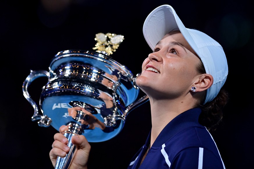 epa09716056 Ashleigh Barty of Australia holds the Daphne Akhurst Memorial Cup after winning the Women?s singles final against Danielle Collins of the USA at the Australian Open grand slam tennis tourn ...
