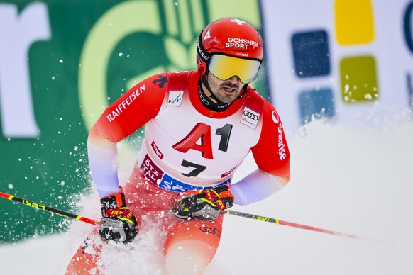 epa12483808 Loic Meillard from Switzerland reacts in the finish area during the second run of the Men?s Giant Slalom race of the FIS Alpine Ski World Cup season opener on the Rettenbach glacier, in So ...