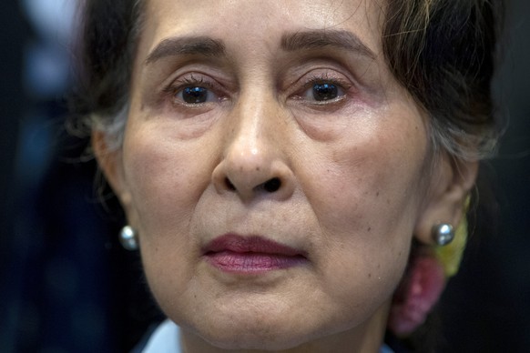 FILE - Myanmar&#039;s leader Aung San Suu Kyi waits to address judges of the International Court of Justice in The Hague, Netherlands on Dec. 11, 2019. Ousted Myanmar leader Suu Kyi pleaded not guilty ...