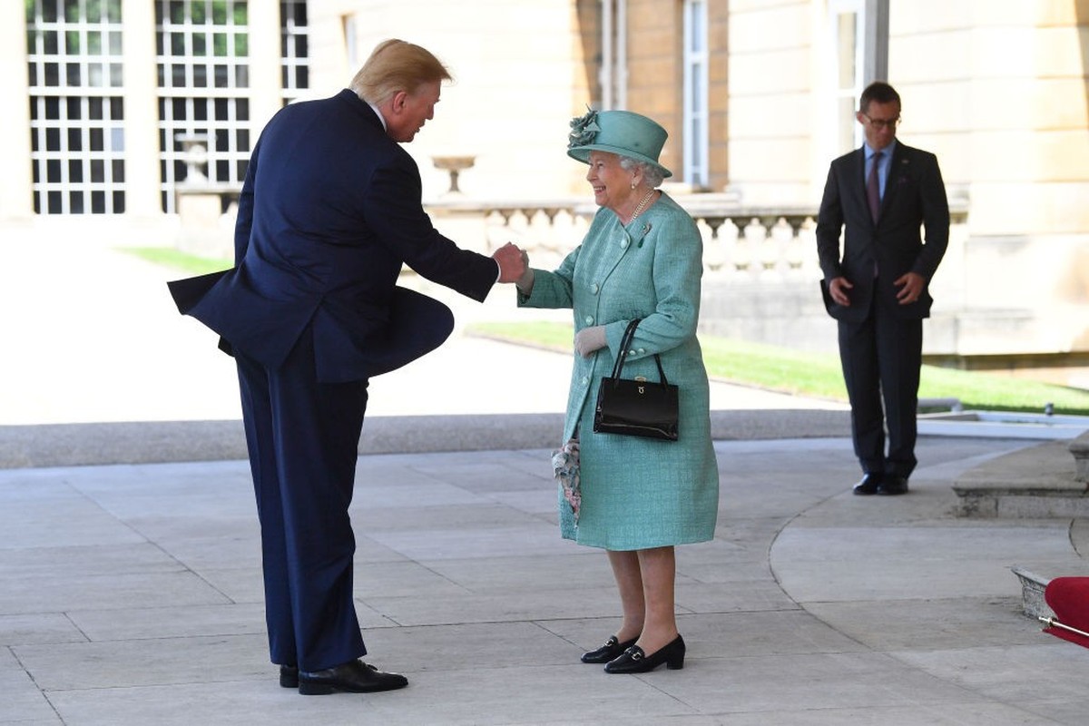 LONDON, ENGLAND - JUNE 03: U.S. President Donald Trump is greeted by Queen Elizabeth II at Buckingham Palace on June 3, 2019 in London, England. President Trump's three-day state visit will inclu ...