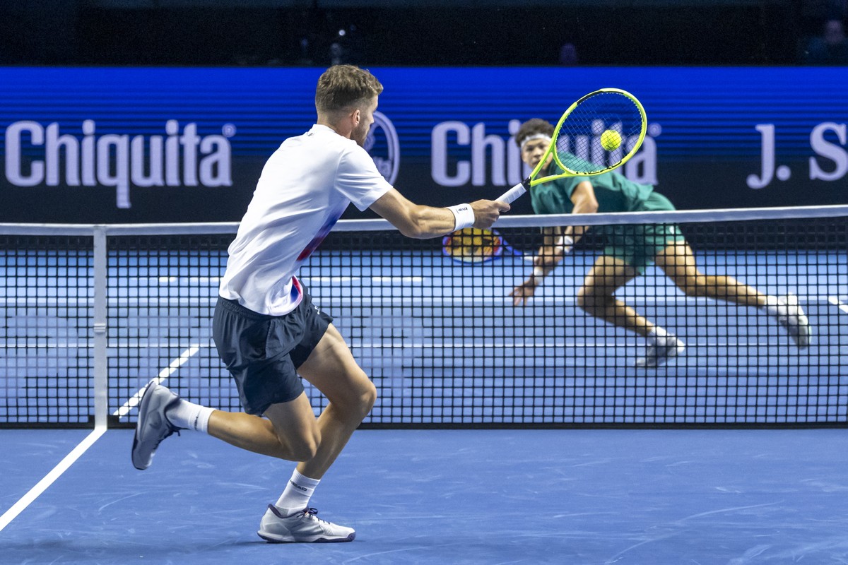 Switzerland's Jerome Kym, left, during his round of sixteen match against USA's Ben Shelton, right, at the Swiss Indoors tennis tournament at the St. Jakobshalle in Basel, Switzerland, on Th ...