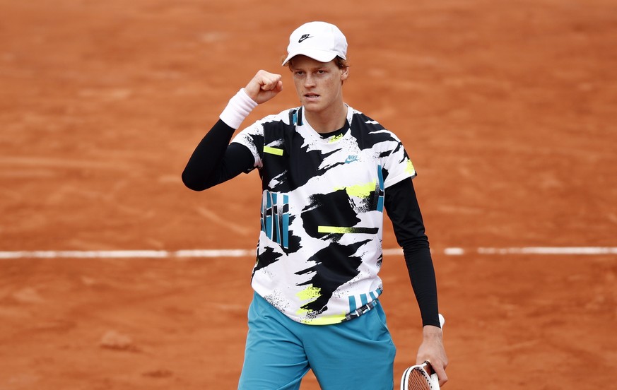 epa08720025 Jannik Sinner of Italy reacts after winning against Alexander Zverev of Germany their men?s fourth round match during the French Open tennis tournament at Roland ?Garros in Paris, France,  ...