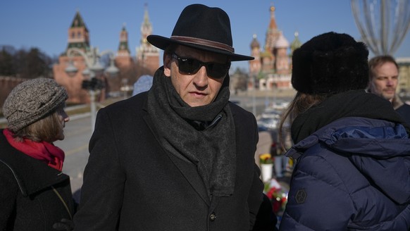 German Ambassador to Russia Alexander Graf Lambsdorff speaks to journalists after laying flowers in Moscow, Russia, Thursday, Feb. 27, 2025, at the place where Russian opposition leader Boris Nemtsov  ...