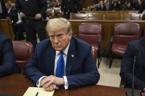 Former President and Republican presidential candidate Donald Trump sits during his trial at Manhattan criminal court in New York, on Monday, April 22, 2024. Opening statements in Trump&#039;s histori ...